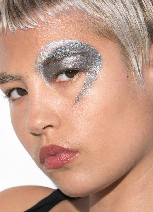 Model wears Freestyle Color Cream in Known Unknown in a dramatic eye look with Brother Sister as a highlight